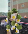 Detail view of handmade crochet potted plant car mirror charm with white flowers - White Daisy/Style 1