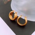 Macro shot of matte brushed gold-plated wide hoop earrings with luxury engraved detail - Thick Golden C-Shape Hoop (11#)