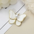 Elegant gold butterfly brooch with pearl center and white textured enamel wings - Single Item / White