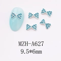Detail of blue rhinestone bow nail charms with silver metal base and size dimensions - Aqua Blue Rhinestone Bow Charm (A627)