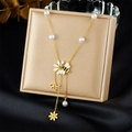 Golden daisy and bee Y-necklace with white pearls on a display gift box setup - Bee Daisy Pendant Style (N3547)