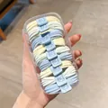 Blue and beige elastic hair ties with cartoon bear charms in a clear storage box - Sea Salt Blue (Bear Design) 10Pcs/Box