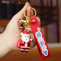 3D Weihnachtsmann Schlüsselanhänger aus Silikon mit rotem Armband und Glocke - Weihnachtsmann B