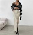 Close-up of beige high-waist faux leather skirt with side slit and matching belt - S / Bottoms / White