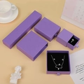 Elegant purple drawer jewelry boxes with textured finish for rings and necklaces - Purple