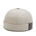 Off-white cotton docker cap featuring three black side stripes for street fashion wear - Adjustable / Beige