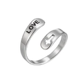 Close-up of adjustable silver ring featuring LOVE engraving and hollow cross design - Love Cross / Steel