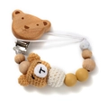Handmade crochet bear baby pacifier clip with natural wooden beads and silicone accents - Brown