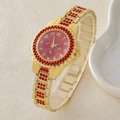 Elegant gold quartz watch for women with vibrant red rhinestones and glittery dial - 5-554 Gold Red