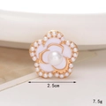 Detailed close-up of a 2.5cm white enamel camellia flower charm with pearls and gold edging - C486 Enamel Pearl Flower White