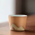 Japanese style ginger yellow ceramic teacup with 50ml capacity and mountain relief texture - Tapered Cup / Ginger Yellow