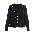 Detailed view of the elegant pearl buttons and black feather trim on a knit cardigan - S / Black