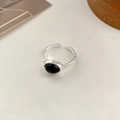 Adjustable S925 silver ring featuring a large oval black gemstone with textured details - Black Oval Gemstone Opening Style(JZ0307)
