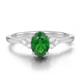 Elegant silver ring featuring oval green gemstone and white diamond accents - Emerald Green