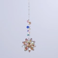 Detail of crystal flower suncatcher with faceted beads for window and garden decor - Dark Amber