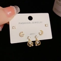 Detailed macro view of S925 silver needle stud earrings set with moon and pearl motifs - Gold-Rhinestone Star Moon Set (50#)
