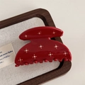 Macro detail of a red acetate hair claw clip featuring sparkling rhinestones and golden dots - Red
