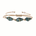 Bohemian woven bracelet with blue ceramic conch beads and white pearls on white background - Spotted Blue