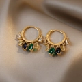 Elegant gold hoop earrings with multi-colored gemstone charms on silk background - Multi-Color Pendant Style / Gold Green Blue