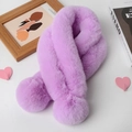 Detail showing plush faux rabbit fur texture of a purple winter scarf in an aesthetic setting - Taro