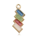 Zigzag jewelry charm with blue, green, red and white enamel in golden finish - Four Color Blocks
