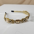 Detail of baroque gold headband with champagne crystals and pearls on white card - Square Gemstone Champagne
