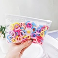 Close-up of colorful high-elastic mini hair ties in a transparent zipper PE bag - Mixed Color Daisy Bag