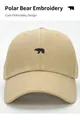 Close-up of polar bear embroidery detail on khaki cotton twill baseball cap - Khaki