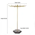 Rotating gold jewelry rack with 12 hooks and black marble base for necklace storage - Gold