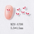 Macro view of 5.5*4.5mm red butterfly nail charms with silver edges and oil-drop finish - Silver Base Red (A708)
