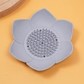Lotus shaped grey silicone soap dish with non-slip texture and drainage holes - Gray