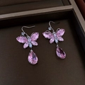 Close-up of butterfly earrings with pink crystal teardrop pendants in silver finish - 40# Ear Hook-Purple-Bowknot