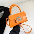 Bright orange PU leather crossbody bag featuring a crystal buckle and ruched top handle - Orange