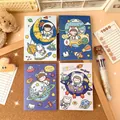 Mini astronaut notebook set with colorful space station cartoon illustrations for students - Space Odyssey