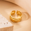 Adjustable golden titanium steel ring with unique irregular hammered texture and matte finish - Irregular Hammered/BJGR0144
