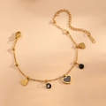 Bracciale in acciaio inossidabile dorato con ciondoli a cuore e perline di smalto nero - Stile Cuore Dorato (I516)