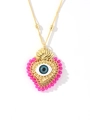Dettaglio del ciondolo a cuore in oro 18k con occhio azzurro e perline rosa - Rosa Rosso