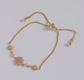 Adjustable gold star and circle bracelet featuring sparkling cubic zirconia stones - Gold Round Burst Star