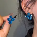 Detailed macro view of square cut royal blue crystal cluster earrings with metal base - 3# Silver Earring Post - Blue Square Crystal