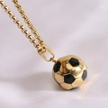 Close-up of a 3D gold football pendant necklace with black enamel soccer details - Gold With Chain