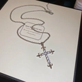 Silver gothic cross necklace with pavé zircons and fleur-de-lis details on gift box - Silver Rhinestone Fleur De Lis Cross Necklace