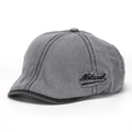 Detail of gray washed denim newsboy cap featuring a Natural embroidered side patch - One Size / Light Gray With Dark Gray (G)