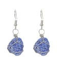 Detail of handmade wire-wrapped silver earrings with natural blue lapis lazuli stones - Silver + Lapis Lazuli