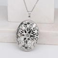 Oval silver locket necklace with vintage镂空 geometric design and delicate chain - Hollow Oval/Steel