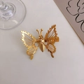 Elegant gold hollow butterfly hair clip with metallic ribbon wings and duckbill clip - Butterfly Duckbill Clip / Gold