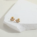 Detail of evil eye stud earrings with colorful zircons on golden metal base - Colorful Zircon Evil Eye