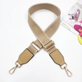 Close-up of khaki wide canvas shoulder strap with gold metal hooks and PU leather ends - Khaki & Khaki
