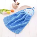 Detail of hanging blue coral fleece hand towel with apple print loop on white wood background - Small / Blue