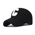 Close-up of white C-letter embroidery on black Sherpa fleece baseball cap texture - Adjustable / Black