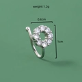 Macro shot of silver nose ring with cubic zirconia flower and size specifications - Round Flower (SE1584)